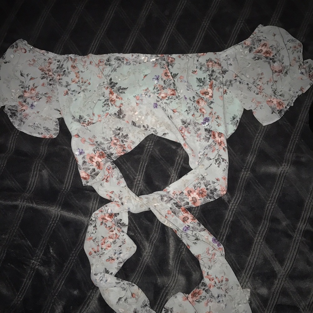 Flower crop top with wrap around tie Size M .